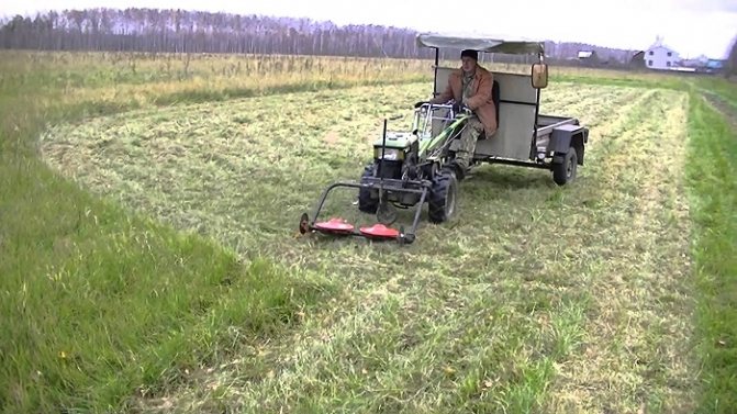 Walk-behind tractor with rotary mower