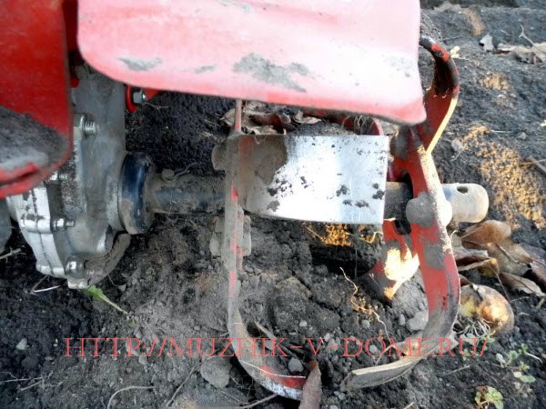 Installing cutters on a walk-behind tractor